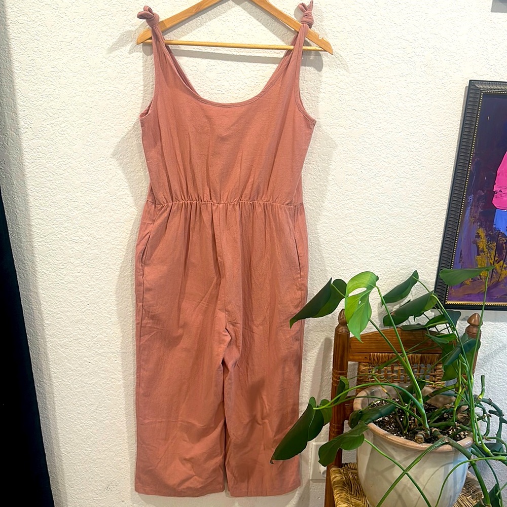 Pale pink/blush romper with ties on the shoulders! Medium size + length